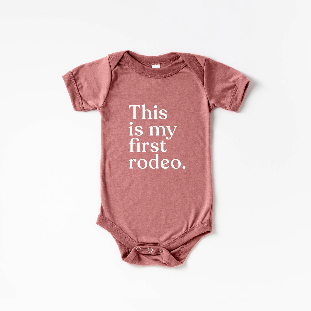 Gladfolk - This Is My First Rodeo Modern Baby Bodysuit
• Mauve Outfit: 3-6M